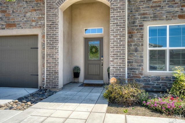 6207 Provincetown Ave, Bakersfield, CA 93313 - entrance to property featuring a garage and brick siding