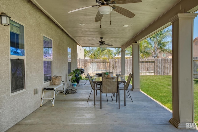 6207 Provincetown Ave, Bakersfield, CA 93313 - fenced backyard with outdoor dining area, ceiling fan, and a patio area