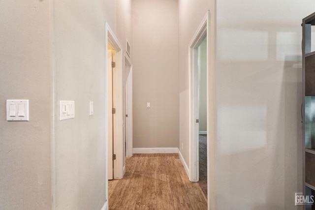 6207 Provincetown Ave, Bakersfield, CA 93313 - corridor with wood finished floors and baseboards
