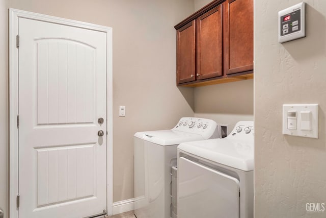 6207 Provincetown Ave, Bakersfield, CA 93313 - washroom with washer and clothes dryer and cabinet space
