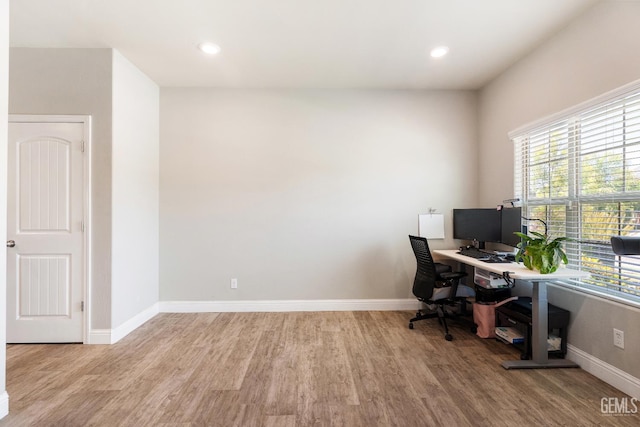 6207 Provincetown Ave, Bakersfield, CA 93313 - home office featuring light wood-style floors and recessed lighting