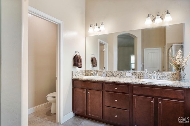 6207 Provincetown Ave, Bakersfield, CA 93313 - bathroom with tile patterned flooring, double vanity, and a stall shower