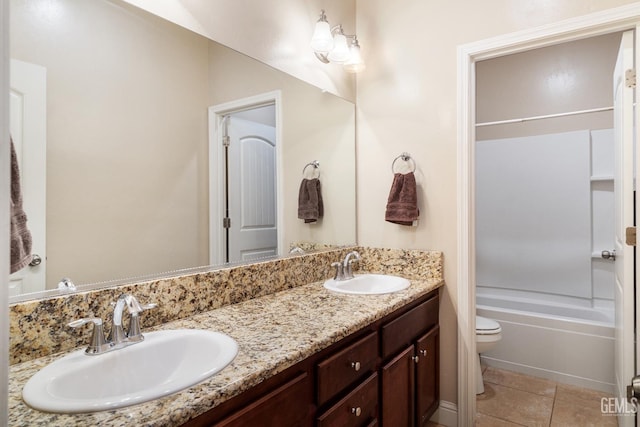 6207 Provincetown Ave, Bakersfield, CA 93313 - full bath featuring double vanity, shower / bath combination, and tile patterned floors