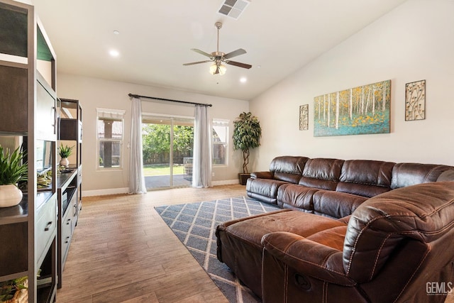 6207 Provincetown Ave, Bakersfield, CA 93313 - living room featuring vaulted ceiling, ceiling fan, light wood-style flooring, and recessed lighting