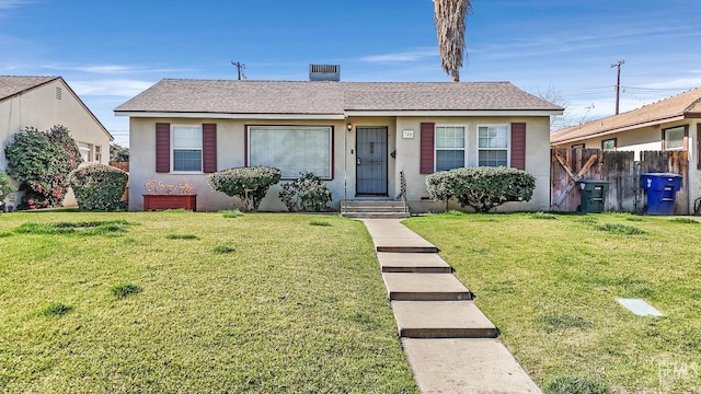 bungalow with a front lawn