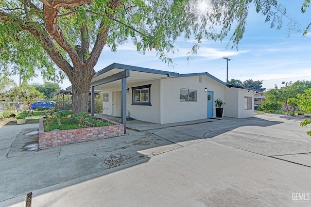 view of front of house with a patio