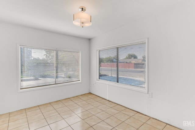 view of tiled spare room