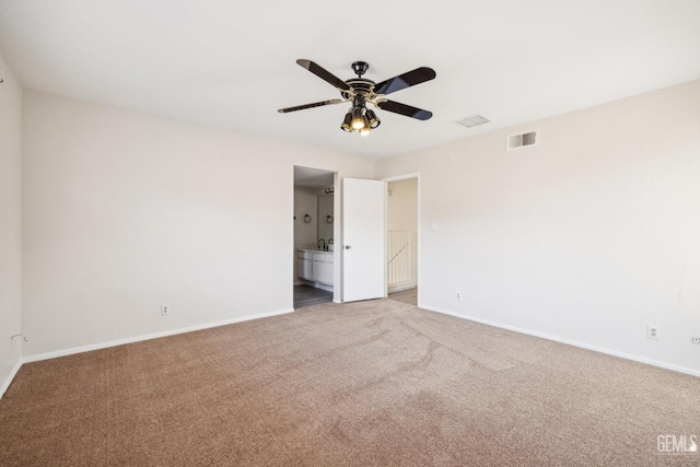 unfurnished room featuring carpet flooring and ceiling fan