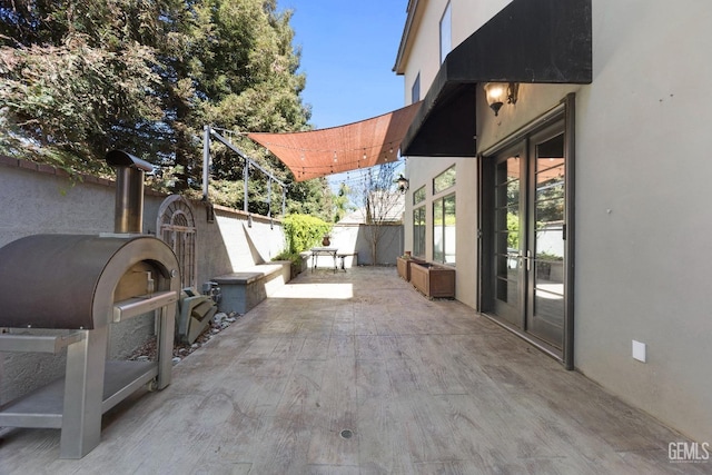 view of patio / terrace with fence