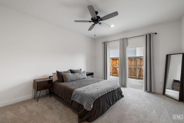 bedroom with light colored carpet, access to outside, baseboards, and a ceiling fan