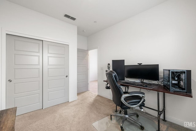 office area featuring carpet flooring and baseboards