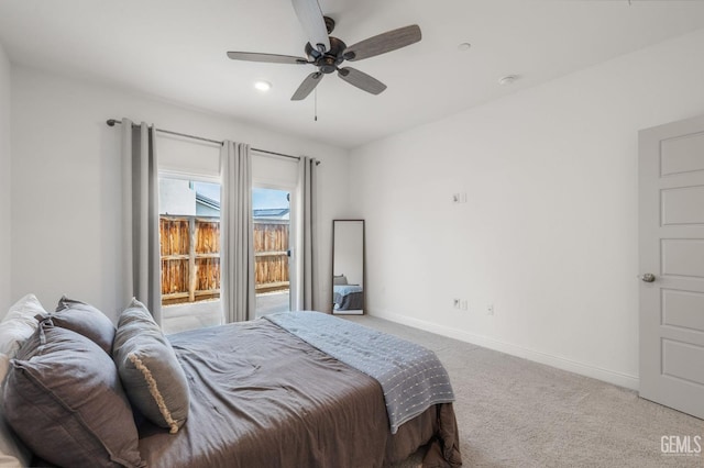 bedroom with carpet floors, baseboards, and a ceiling fan