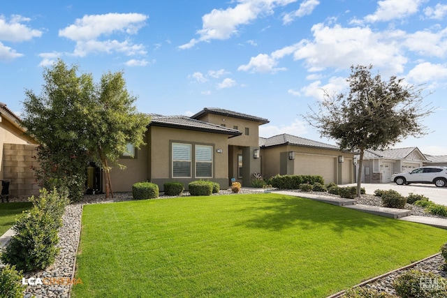 prairie-style house featuring a front yard and a garage