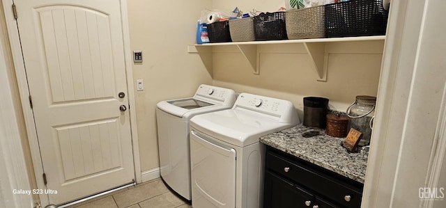 9211 Woodbrook Dr, Shafter, CA 93263 - laundry area featuring light tile patterned floors, laundry area, and washing machine and clothes dryer