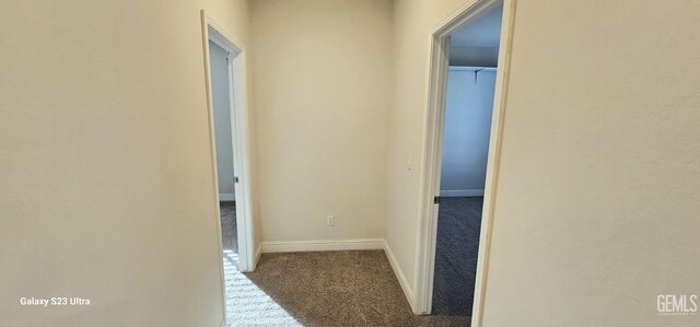 9211 Woodbrook Dr, Shafter, CA 93263 - hallway with carpet floors and baseboards