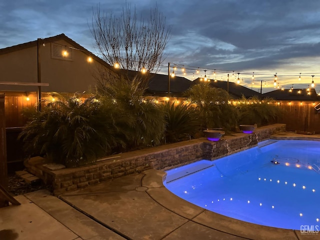 9211 Woodbrook Dr, Shafter, CA 93263 - view of swimming pool featuring a patio area and a fenced in pool