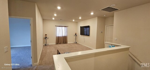 9211 Woodbrook Dr, Shafter, CA 93263 - corridor featuring carpet flooring, visible vents, baseboards, and recessed lighting
