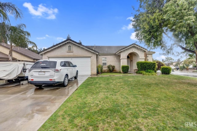 ranch-style home with stucco siding, a front lawn, an attached garage, and driveway