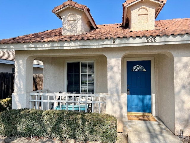 property entrance with a porch