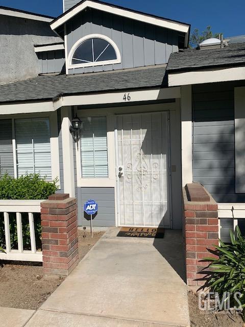2600 Brookside Dr Unit 46, Bakersfield, CA 93311 - property entrance featuring board and batten siding and roof with shingles