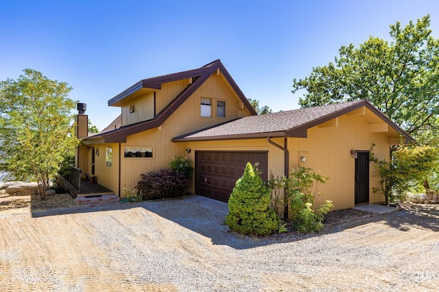 25001 Cannonero Ct, Tehachapi, CA 93561 - view of front of home with driveway, an attached garage, and roof with shingles