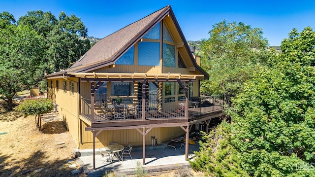 25001 Cannonero Ct, Tehachapi, CA 93561 - rear view of house with a patio, a deck, and roof with shingles