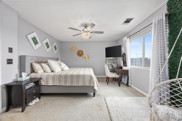 bedroom with light colored carpet and ceiling fan