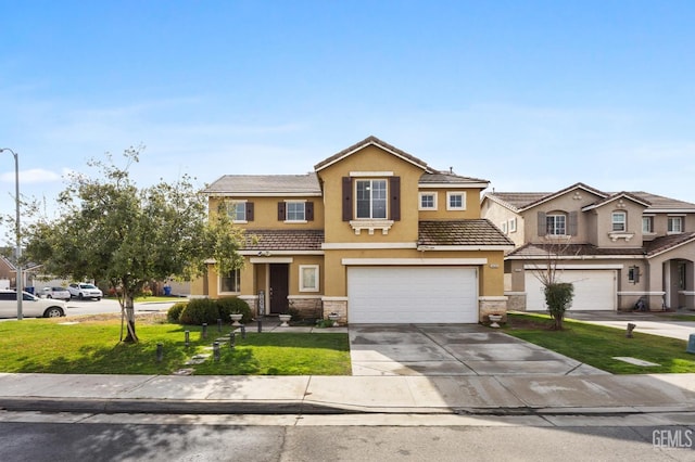 view of front of house with a garage and a front lawn