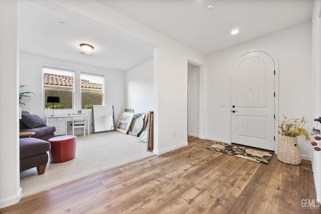 foyer with hardwood / wood-style flooring