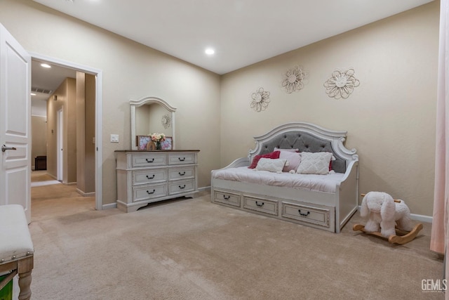carpeted bedroom with baseboards, visible vents, and recessed lighting
