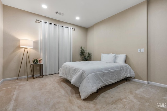 bedroom featuring recessed lighting, carpet flooring, visible vents, and baseboards