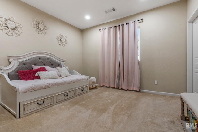 bedroom with light carpet, recessed lighting, visible vents, and baseboards