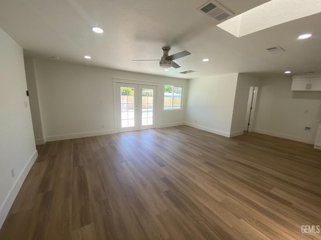 351 Adams St, Wasco, CA 93280 - empty room with a ceiling fan, baseboards, wood finished floors, recessed lighting, and french doors