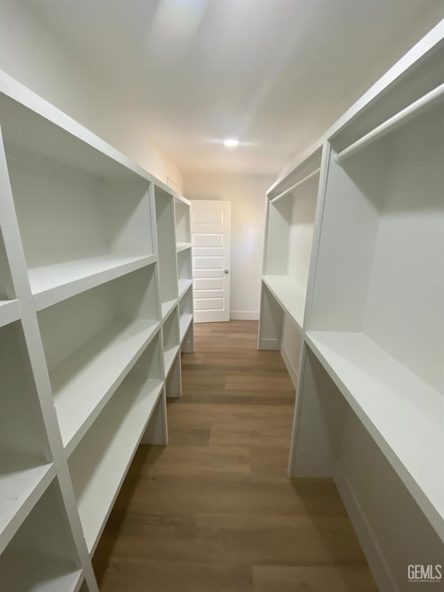 351 Adams St, Wasco, CA 93280 - spacious closet with wood finished floors