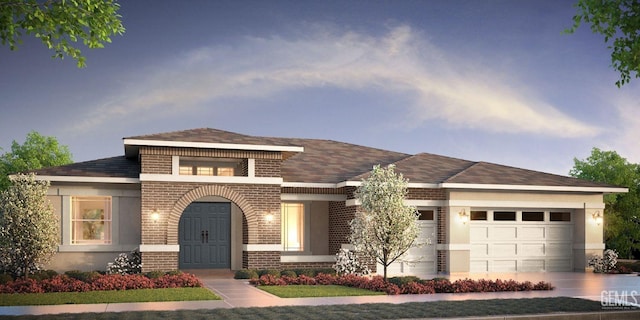 view of front of home with a garage, driveway, and brick siding