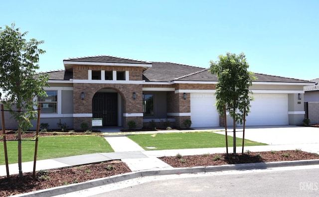 12703 Fairlawn Dr, Bakersfield, CA 93311 - prairie-style home with driveway, a garage, a front lawn, and brick siding