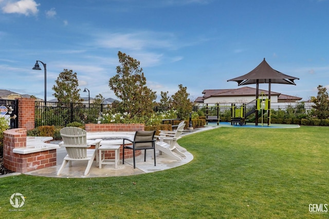 12703 Fairlawn Dr, Bakersfield, CA 93311 - view of yard with an outdoor fire pit and a patio area
