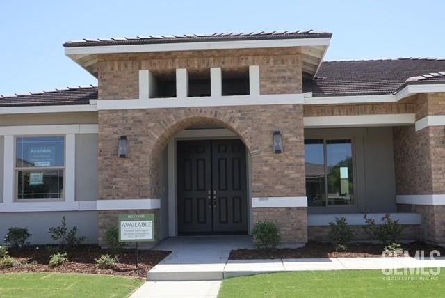 12703 Fairlawn Dr, Bakersfield, CA 93311 - view of exterior entry with stucco siding