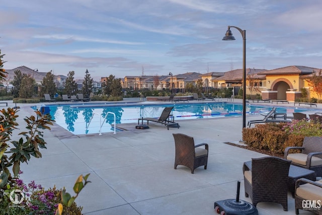 12703 Fairlawn Dr, Bakersfield, CA 93311 - community pool featuring a patio and a residential view