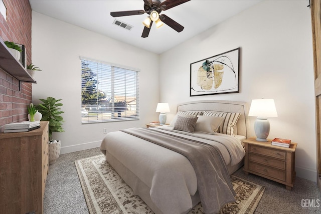 bedroom featuring light colored carpet and ceiling fan