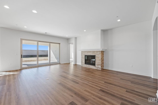 unfurnished living room featuring hardwood / wood-style floors