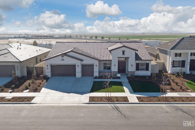 view of front of property featuring a garage