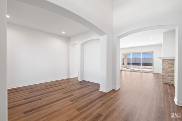 empty room featuring dark hardwood / wood-style floors