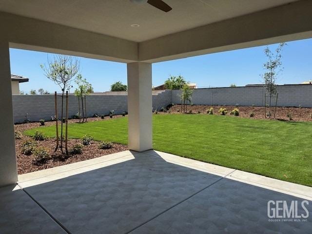 view of patio featuring ceiling fan and a fenced backyard