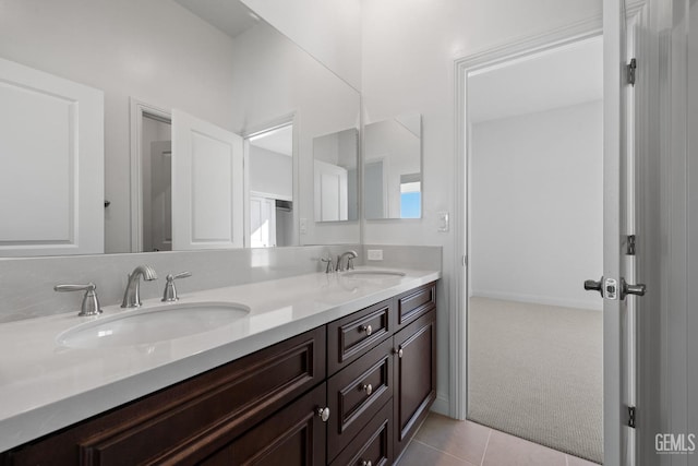 bathroom featuring tile patterned floors and vanity