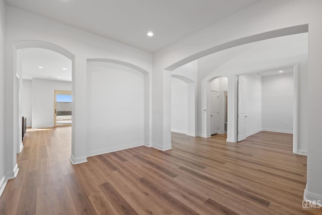 unfurnished room with light hardwood / wood-style flooring