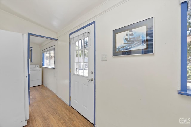 45071 Forest Dr, Posey, CA 93260 - entrance foyer featuring washer / dryer, wood finished floors, and vaulted ceiling