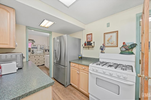 45071 Forest Dr, Posey, CA 93260 - kitchen featuring white gas stove, stainless steel refrigerator with ice dispenser, light brown cabinetry, and light wood finished floors