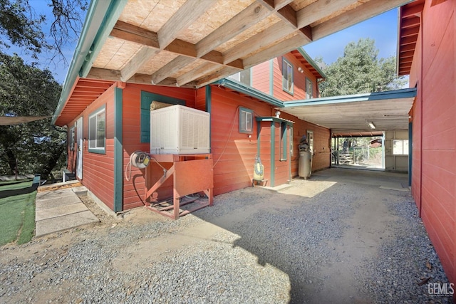 45071 Forest Dr, Posey, CA 93260 - view of property exterior featuring a carport and driveway
