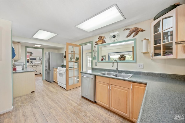 45071 Forest Dr, Posey, CA 93260 - kitchen featuring appliances with stainless steel finishes, light wood-style floors, light brown cabinets, glass insert cabinets, and dark countertops